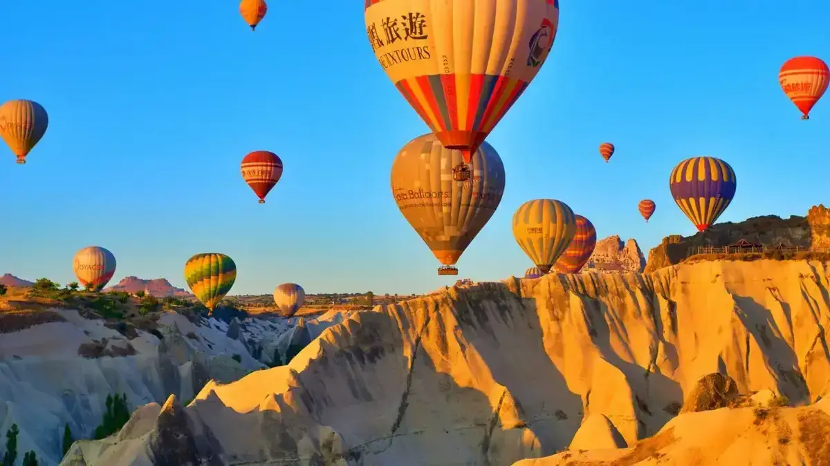 Cappadocia at sunrise with airport transfer service